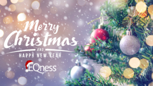 A beautifully decorated Christmas tree with twinkling lights and festive ornaments, accompanied by heartfelt Xmas wishes from the EQness team, symbolizing the joy and warmth of the holiday season.