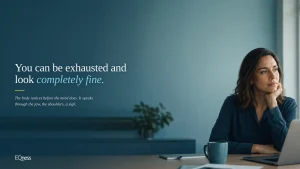Thoughtful woman at her desk &mdash; the physical signs of stress and exhaustion